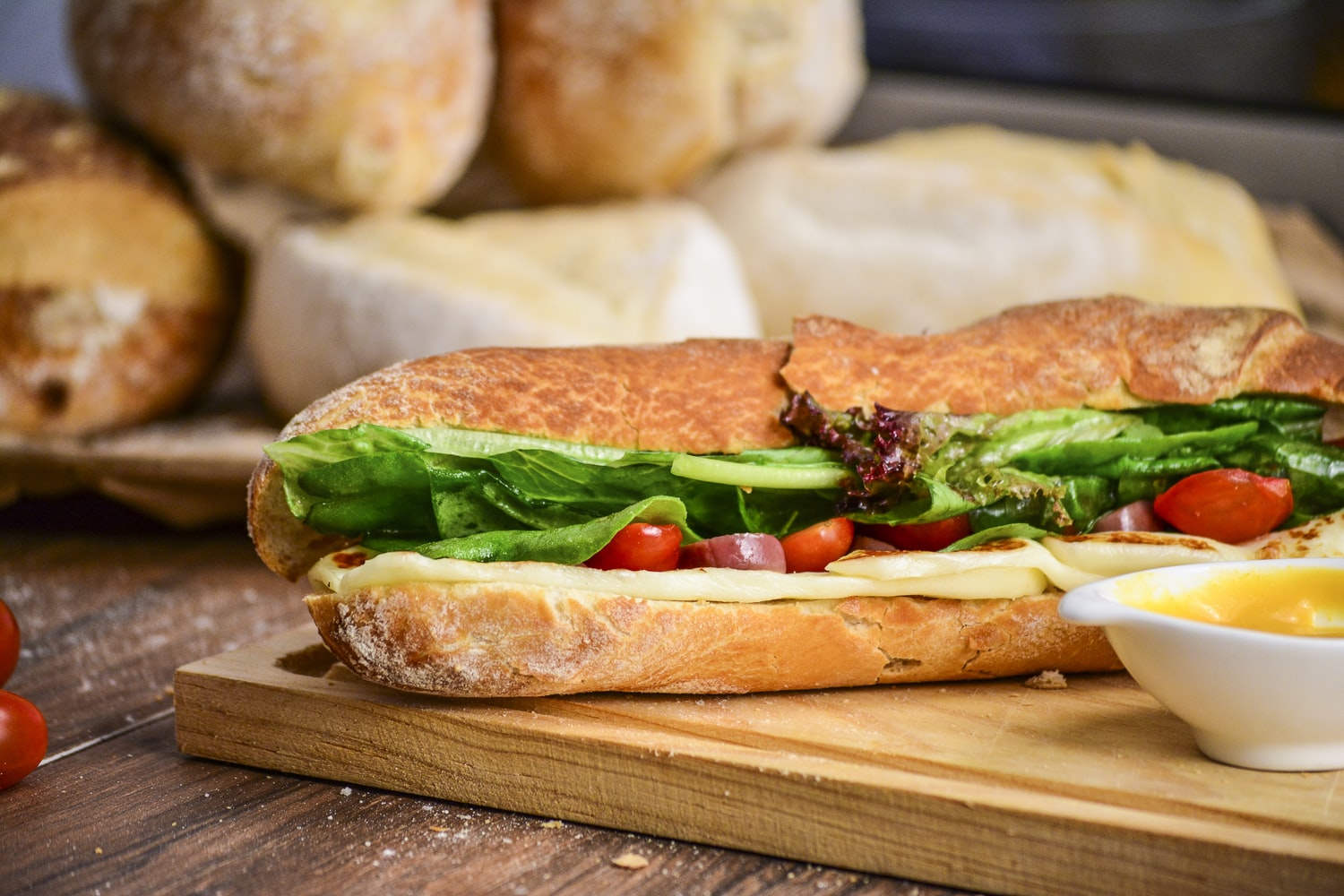 How transactions are added to the blockchain is similar to how sandwiches are prepared. Photo of a sandwich with vegetables and cheese